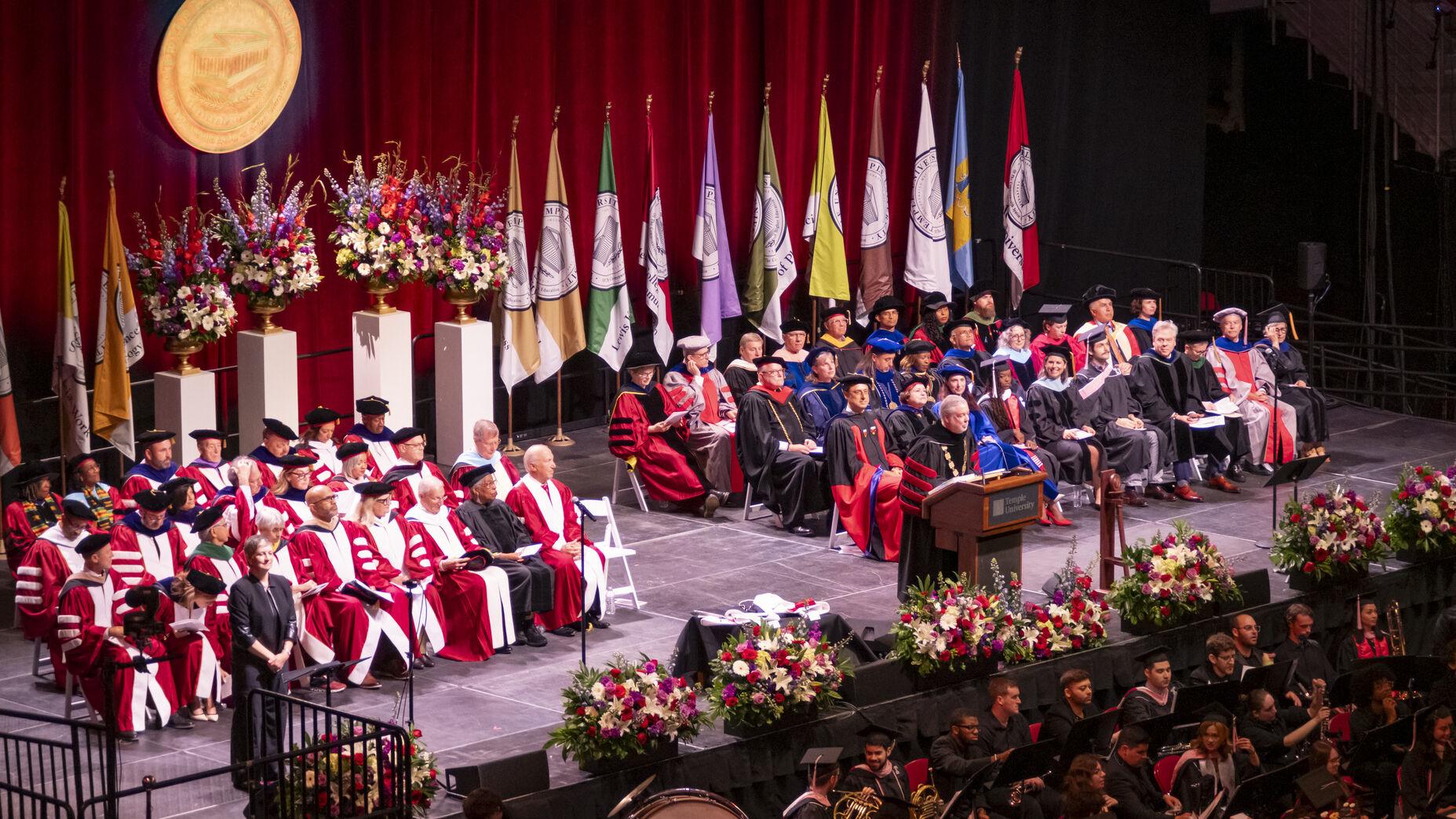 President Fry speaking at podium during Commencement