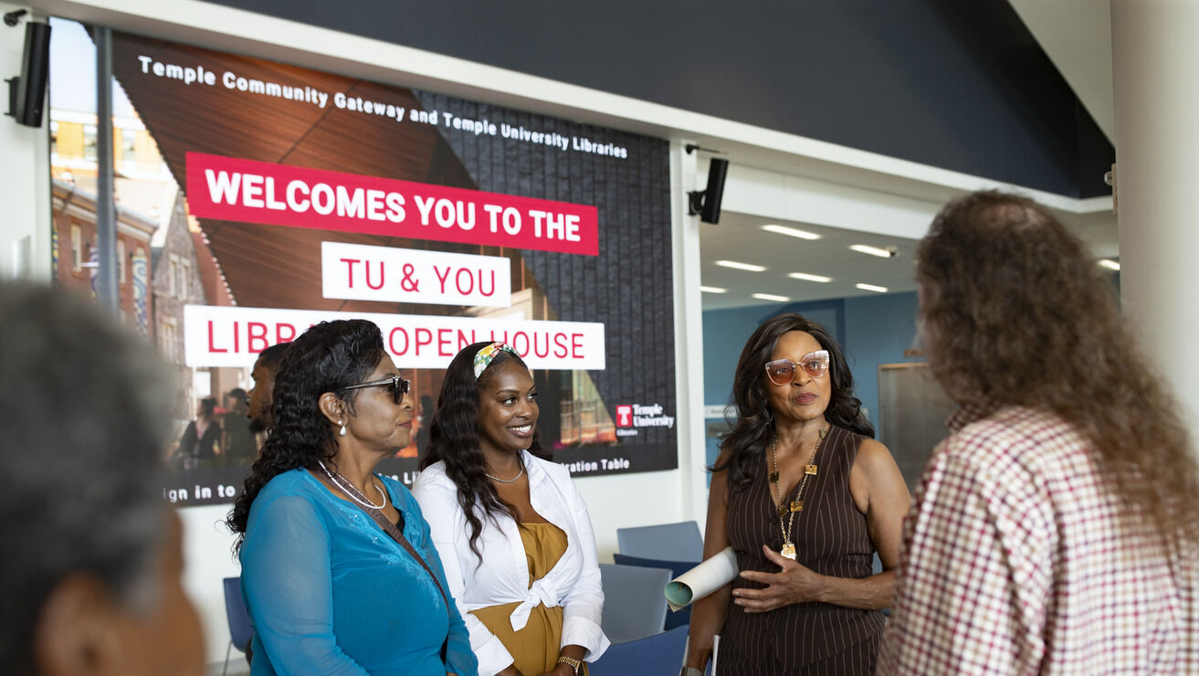 Community members in Charles Library at the TU and You Library Open House