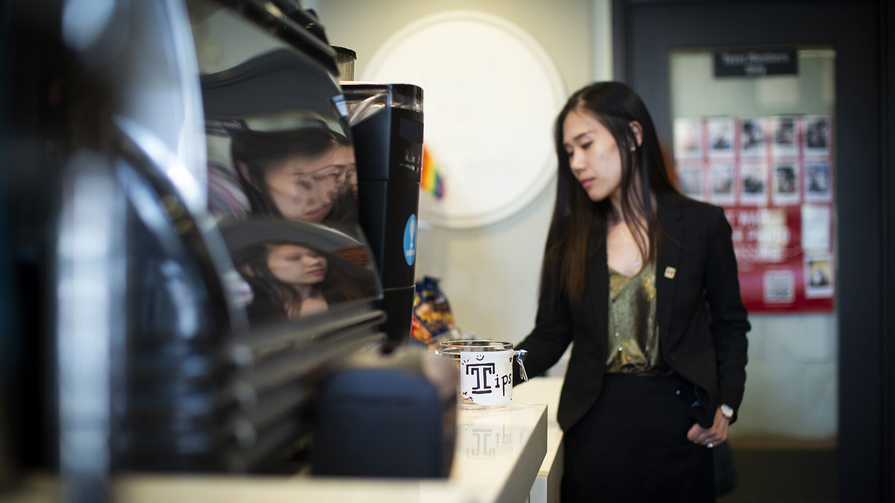 STHM faculty member Lu Lu pictured giving a tip.