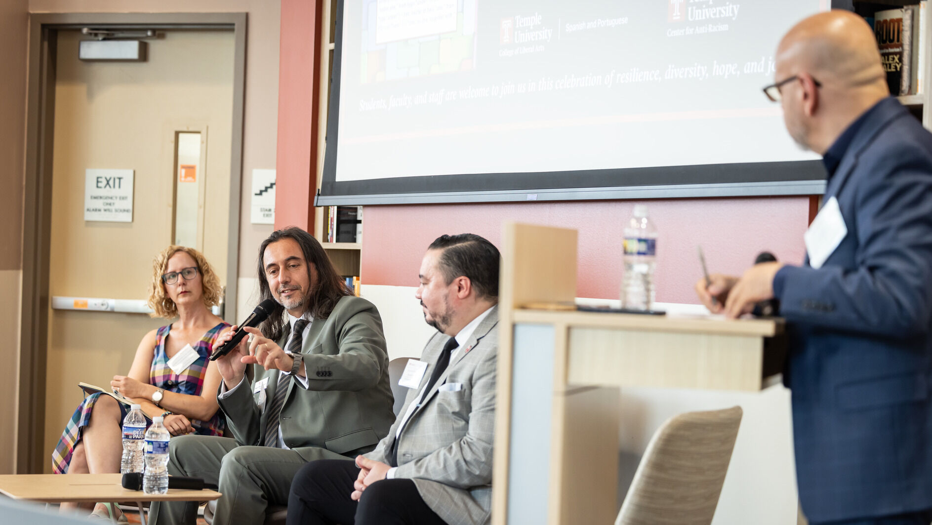 Miguel Mostafá, Mariola V. Alvarez and Michael Usino speaking in the Center for Anti-Racism