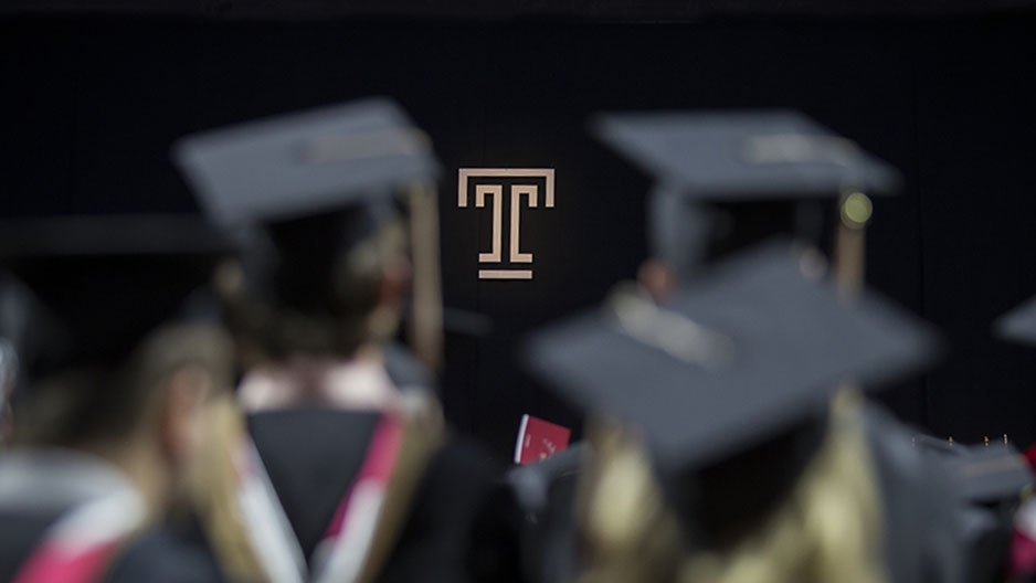 Students wearing caps and gowns