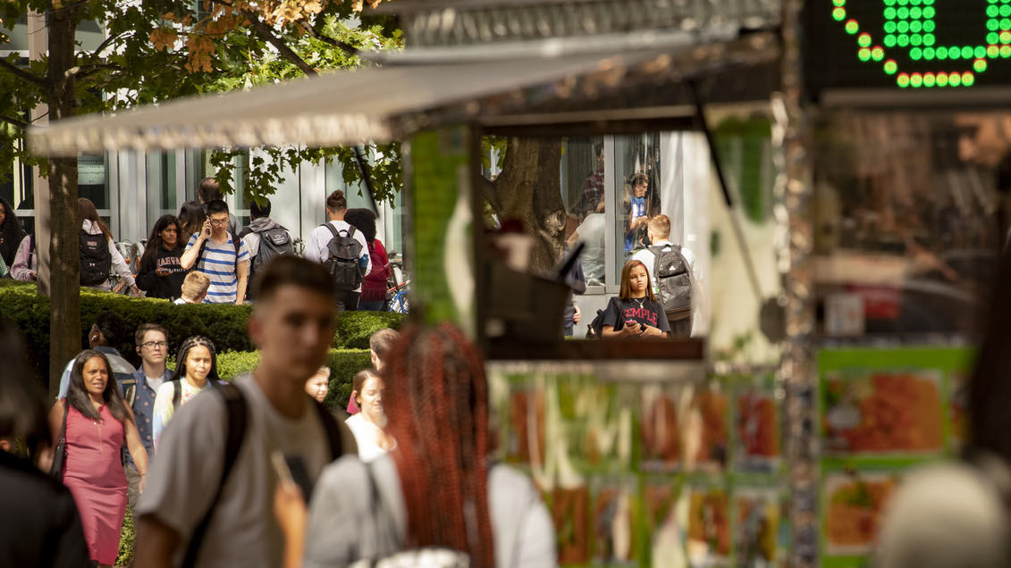 students at a food truck on campus