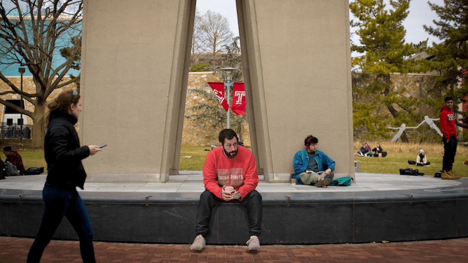 A graphic of Adam Sandler at the Bell Tower. 