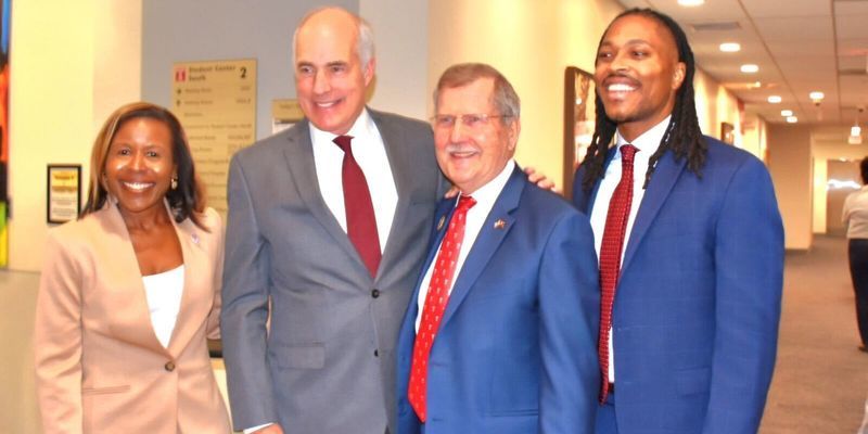 Dean Shealey and President Englert pictured with Senator Casey and Representative Kenyatta.