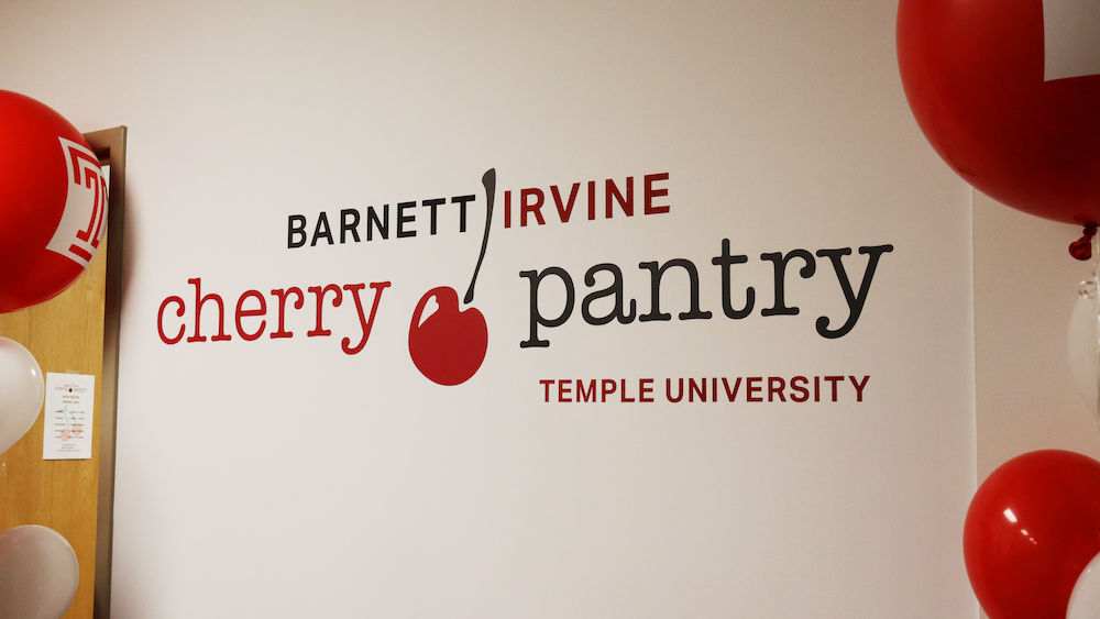 A sign reading Barnett Irvine Cherry Pantry 