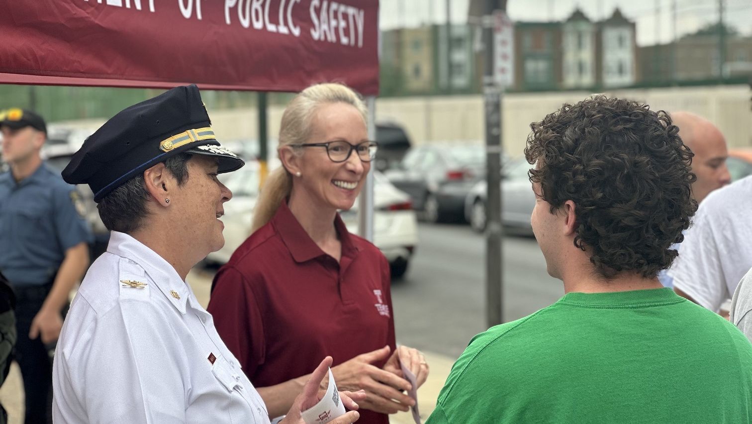 Image of Vice President of Public Safey Jennifer Griffin (center) and Executive Deputy Operations Denise Wilhelm speak with students at the Welcome Wagon on Tuesday