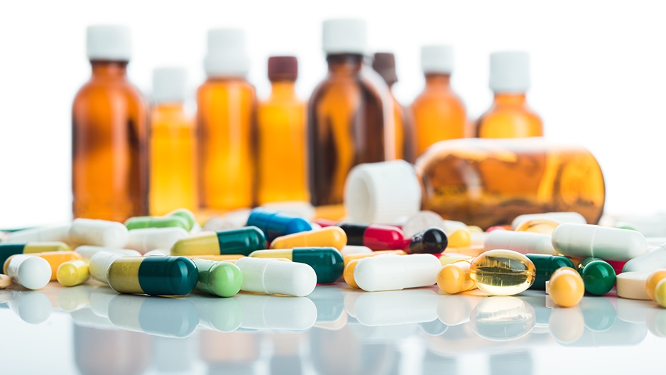 Bottles and pills on display. 