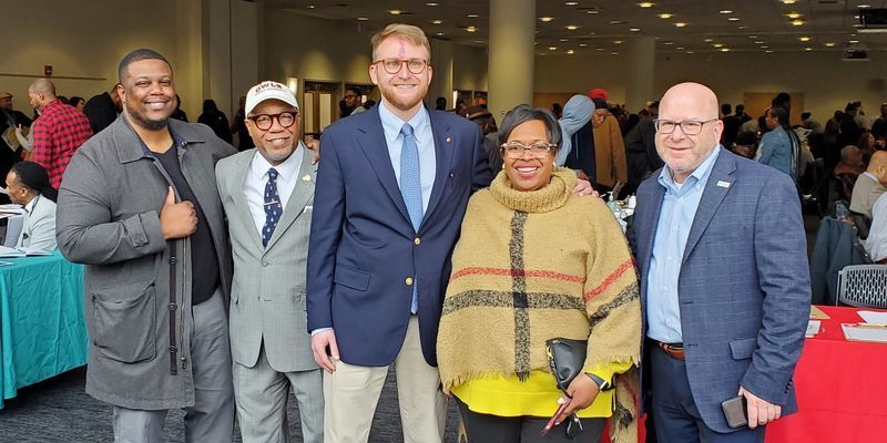 A crowd of participants at a reentry job fair at Temple University.