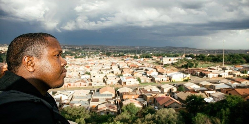 Marvin DeBose looking out over a neighborhood in Johannesburg, South Africa.