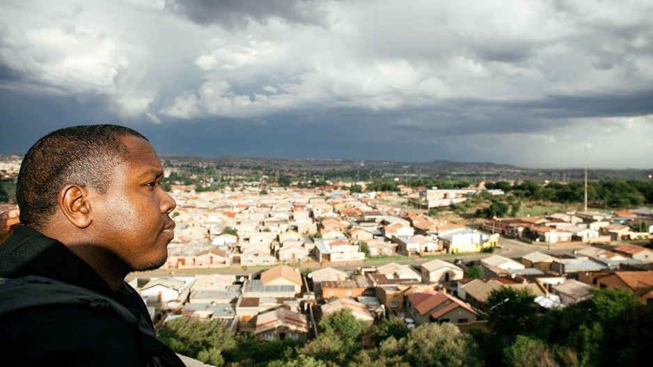 Marvin DeBose looking out over a neighborhood in Johannesburg, South Africa.