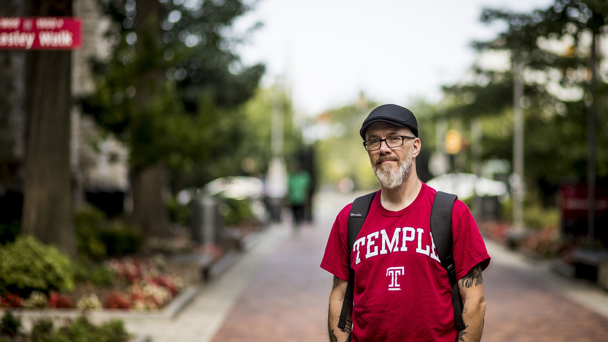 Brian Mengini standing on Liacouras Walk