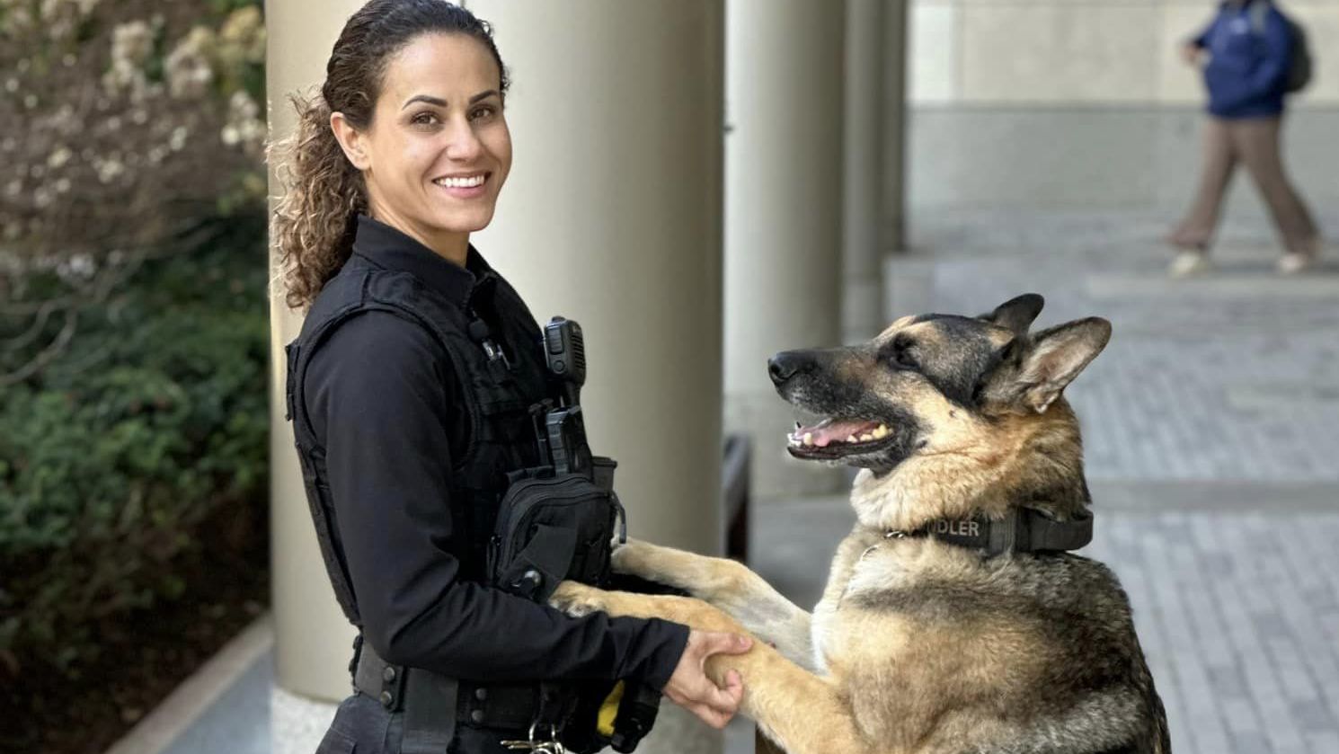Temple Police Officer Natalie Sherman patrols Main Campus with K9 Officer Chandler.