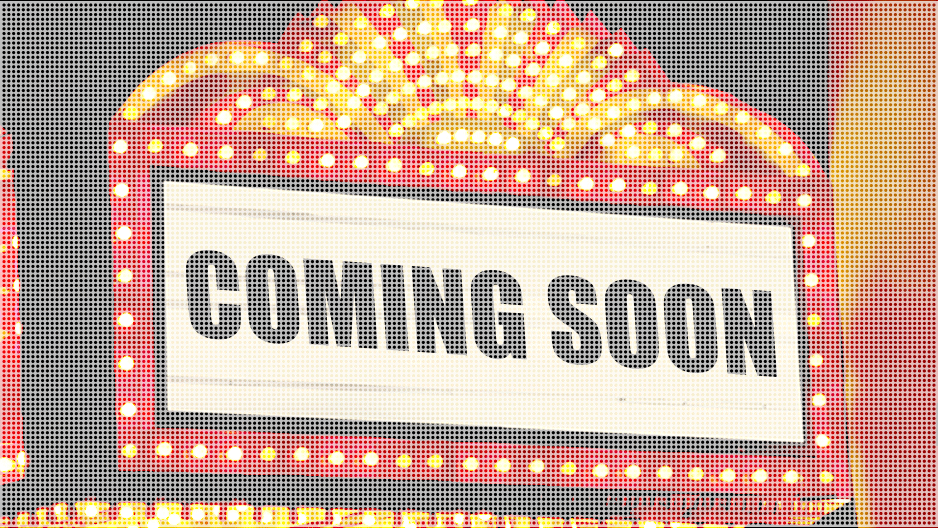 A marquee sign with text that reads "coming soon." 