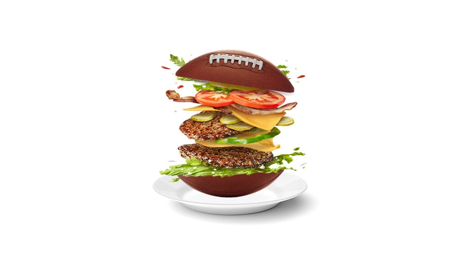 An illustration of a double bacon cheeseburger that has a football as a bun.
