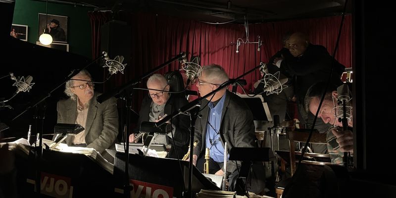 Musicians performing music in a studio 