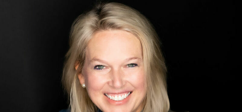 A headshot of Sheri Lambert