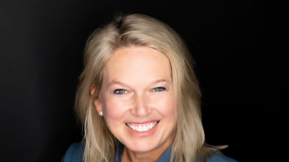 A headshot of Sheri Lambert