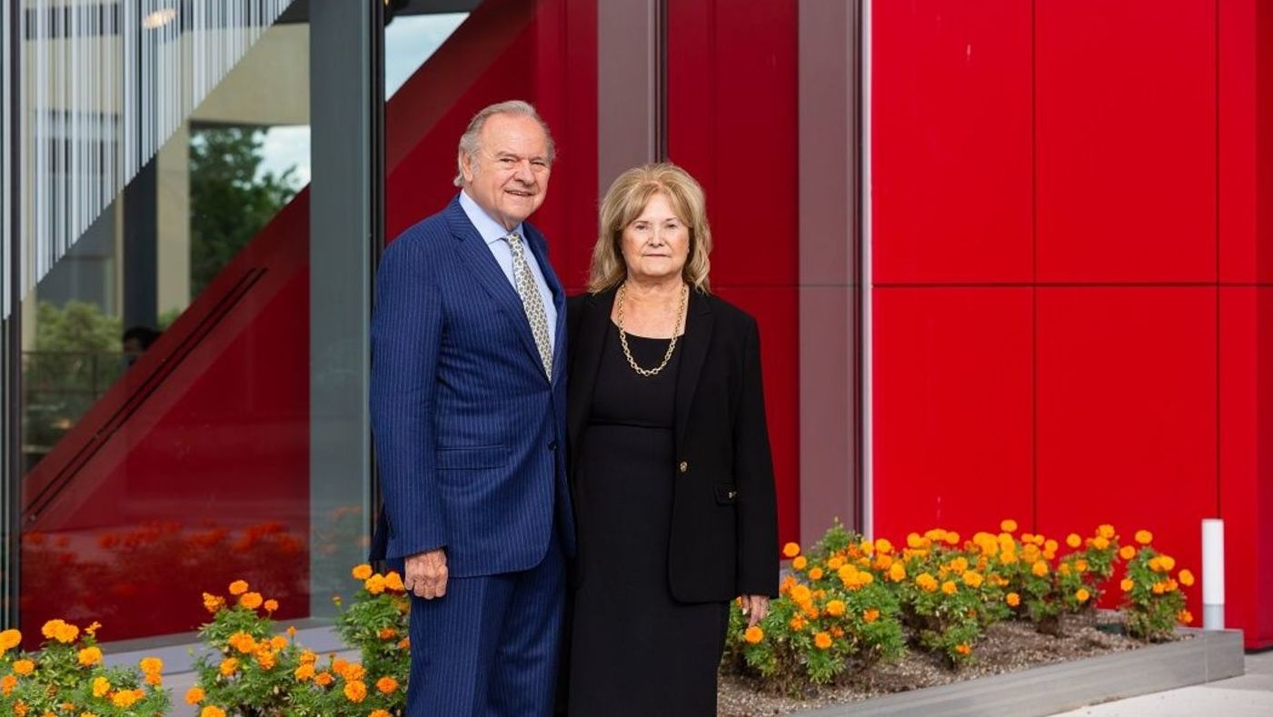 Leonard and Helena Mazur standing in the College of Liberal Arts