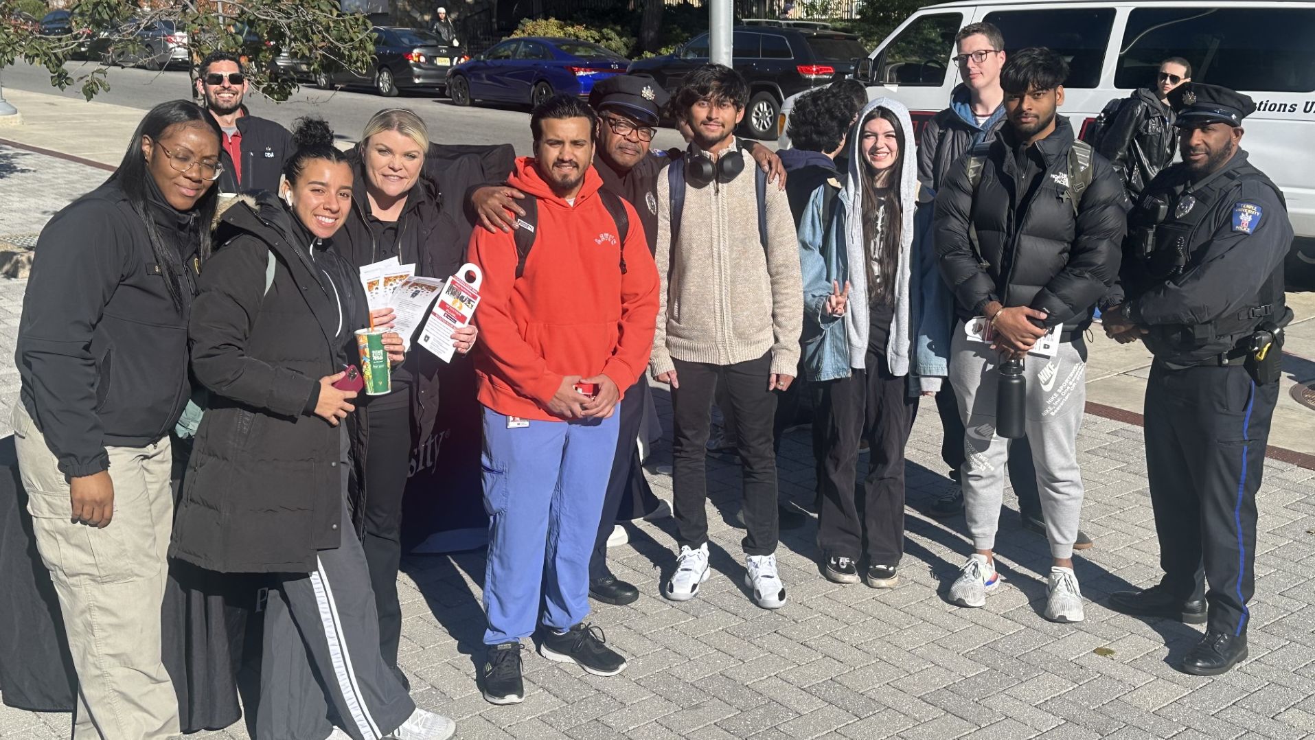 An image of Temple students with Temple Police Officers. 