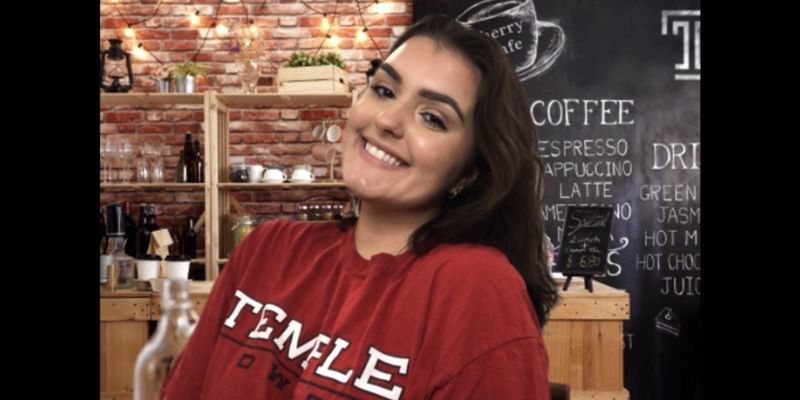 A Temple student attending a Zoom coffeehouse.