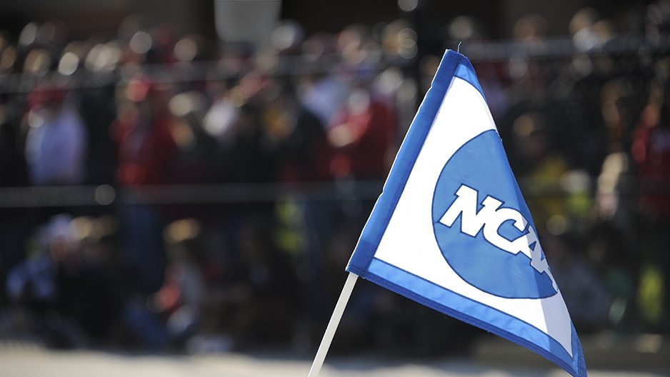 A white and blue flag with the NCAA logo.
