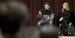 Zosia Mamet and Evan Jonigkeit sitting on stage talking to an audience of students.