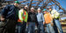 Construction workers standing together at the library site