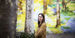Liz Moore standing outside near trees