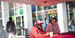 Image of a red canopy tent outside of Maxi’s Pizza, Subs and Bar on campus.