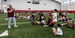 Image of Timothy Welbeck addressing the crowd at the Family Field Day event.