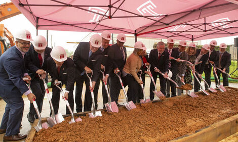 Temple leaders and local dignitaries break ground