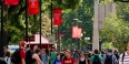 Students walking past the bell tower on Main Campus.