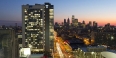 Morgan Hall and the Philadelphia skyline at sunset.