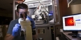A Temple researcher working in a lab