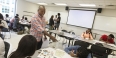 Cey Adams talking to students.