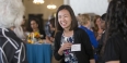 New and current faculty members talking.