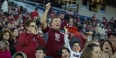 Temple alumnus Bill DeSio cheering in the stands.