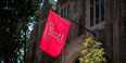 The Temple flag flies outside Sullivan Hall.