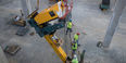 The robotic book retrieval and delivery system is lowered into the new library.
