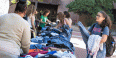 A student at a thrift clothing sale on campus