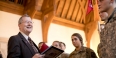 ROTC students present their Ranger Challenge Award to President Richard M. Englert