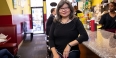 Shirley Moy sitting at a diner counter