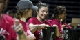 students packing backpacks