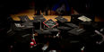 Image of Temple graduates in their graduation caps.