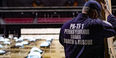 emergency worker setting up medical supplies at Liacouras Center