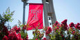 Temple flag flying by the Bell Tower.