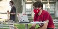 student with a lap top computer