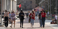 students walk along Liacouras Walk