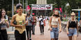Students walking in front of the Bell Tower on Main Campus.