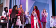 Image of the Le nozze di Figaro cast standing on stage.